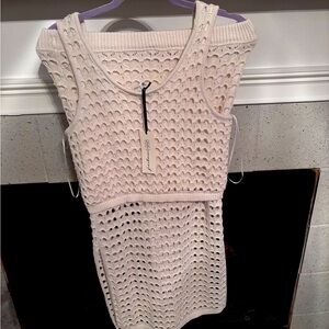 A lined knitted skirt and top set brand new. Smoke and pet free.